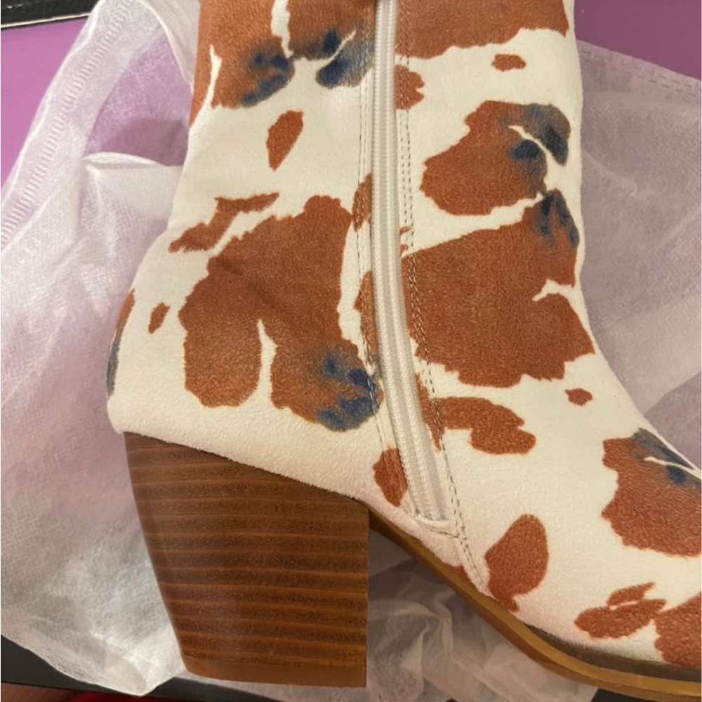 Chic Brown and White Heeled Boots for a Stylish Look
